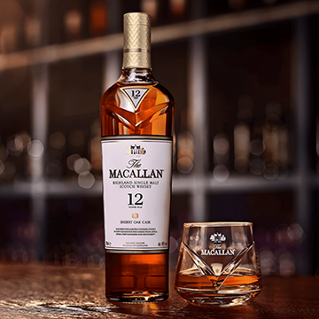 The Macallan 12 Years old with a glass on a wooden counter 13C Jordan Amman